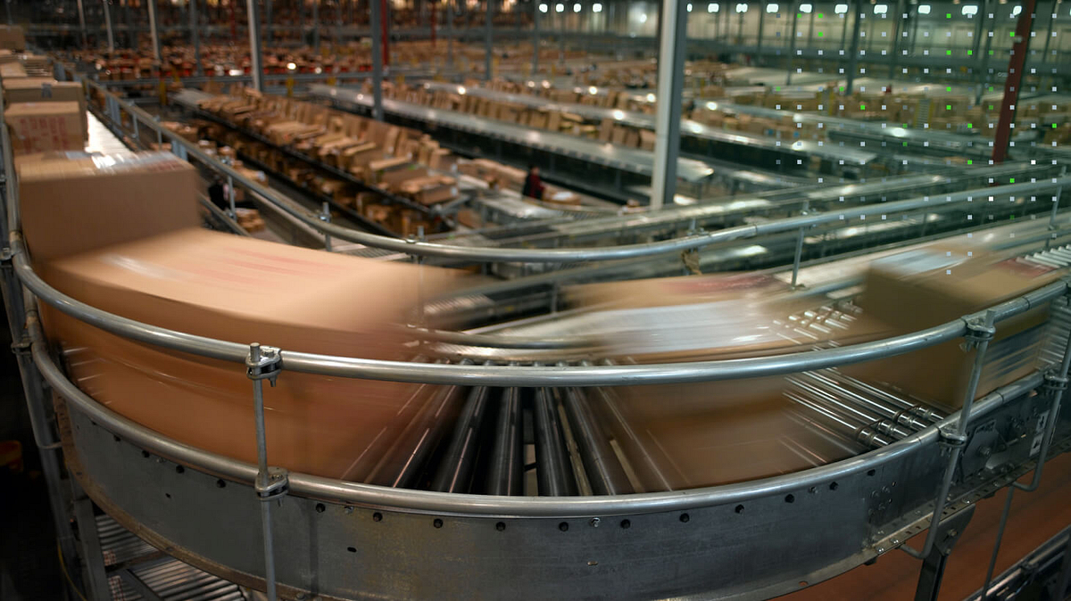 Boxes moving on a conveyor belt