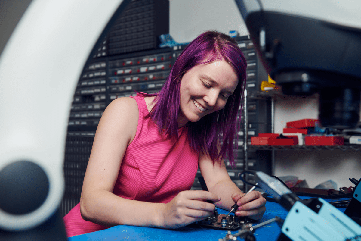 Photo of Katie Bradford working at a desk